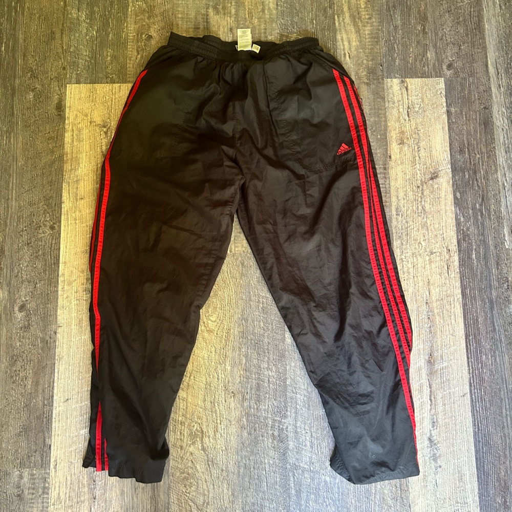 vintage black adidas track pants with red stripes